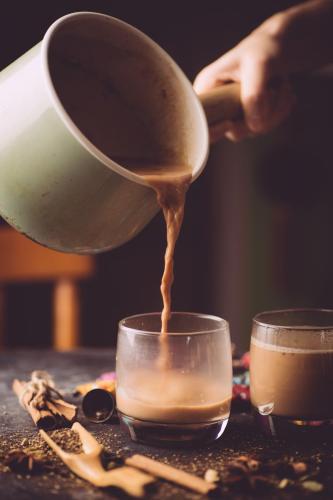 Masala tea ( Masala chai). A traditional hot drink in India and South Asia. Black tea with milk and spices